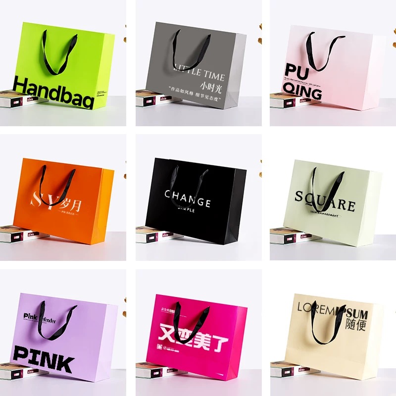 Wholesale Luxury Gift Printed Kraft Paper Tote Bags Retail Clothing Brand logo Customized Shopping Packaging Paper Bags