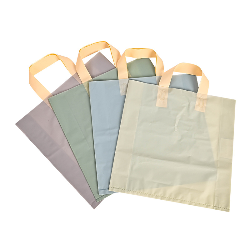  Design Printing PE Plastic Carrying Shopping Packaging Bag Carrier Frosted Folding Handle With Logo Gift Bag